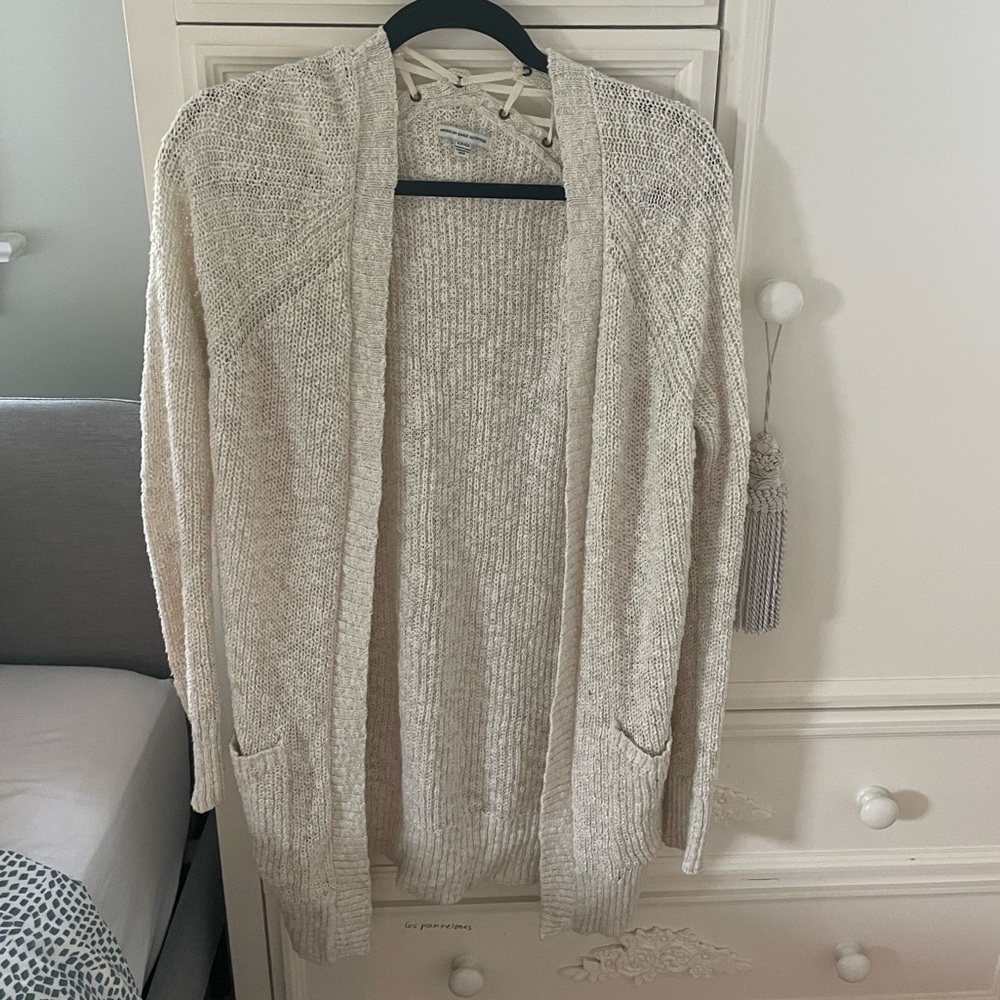 Long cozy cardigan with detailing in the back